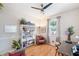 Cozy home office with ample storage, a comfortable chair, and a bright window at 708 Sandy Hills Ave, Tarpon Springs, FL 34689