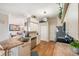 Bright kitchen features stainless appliances, granite counters, ample cabinet space, and eat-in bar area at 708 Sandy Hills Ave, Tarpon Springs, FL 34689