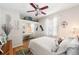 Serene main bedroom with a mirrored closet, soft bedding, and ample natural light at 708 Sandy Hills Ave, Tarpon Springs, FL 34689