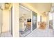 Inviting balcony with rocking chairs, transitioning into a living room with neutral decor at 7872 Sailboat Key S Blvd # 306, South Pasadena, FL 33707