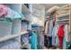 Walk-in closet featuring built-in shelving and storage for clothing and accessories at 7872 Sailboat Key S Blvd # 306, South Pasadena, FL 33707