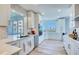 Bright and airy kitchen featuring white cabinets, modern appliances, and scenic water views, perfect for cooking at 7872 Sailboat Key S Blvd # 306, South Pasadena, FL 33707