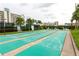 Well maintained shuffleboard courts with seating near the building and ample space for players at 7872 Sailboat Key S Blvd # 306, South Pasadena, FL 33707