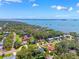Breathtaking aerial view of a waterfront community surrounded by lush trees, showcasing the coastal charm at 8231 31St N Ter, St Petersburg, FL 33710