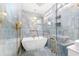 Modern bathroom with a soaking tub, rainfall showerhead, and luxurious finishes at 8231 31St N Ter, St Petersburg, FL 33710