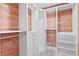 Organized walk-in closet with custom shelving and ample storage space at 8231 31St N Ter, St Petersburg, FL 33710