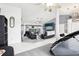 Open-concept living area with pool view, modern furnishings, and stylish decor for relaxation at 8804 Poe Dr, Hudson, FL 34667