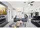 Cozy living room featuring modern decor, neutral colors, and an open layout, creating a comfortable and stylish atmosphere at 8804 Poe Dr, Hudson, FL 34667