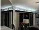 Open-concept living room with sliding glass doors, comfortable seating, and bright decor at 8804 Poe Dr, Hudson, FL 34667