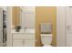 Well-lit bathroom features a white vanity and shower with white subway tiles at 9645 Runaway Breeze Dr, Land O Lakes, FL 34637