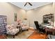 Functional office space with hardwood floors, ample storage, and a comfortable workspace at 10141 Deercliff Dr, Tampa, FL 33647