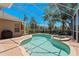 Beautiful screened-in pool with a spa and brick patio area for outdoor enjoyment at 10141 Deercliff Dr, Tampa, FL 33647