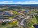 Stunning aerial view of a Primary-planned community featuring golf courses, lakes, and beautifully landscaped homes at 1112 Jasmine Creek Ct, Sun City Center, FL 33573