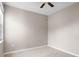 Bedroom with a ceiling fan and light colored flooring at 1112 Jasmine Creek Ct, Sun City Center, FL 33573