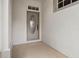 Close up of the front door with textured wall at 1112 Jasmine Creek Ct, Sun City Center, FL 33573