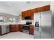 Modern kitchen features stainless steel appliances and plenty of cabinet space at 1112 Jasmine Creek Ct, Sun City Center, FL 33573