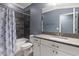Cozy bathroom features a shower-tub combo with a modern vanity and stylish fixtures at 11442 Crowned Sparrow Ln, Tampa, FL 33626