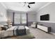 Serene bedroom featuring soft colors, natural light, and comfortable furnishings, creating a tranquil retreat at 11442 Crowned Sparrow Ln, Tampa, FL 33626