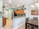 The home features an open concept living area, dining, and kitchen with stainless appliances at 11457 Captiva Kay Dr, Riverview, FL 33569
