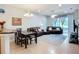 Living and dining area are combined in this open floor plan layout, perfect for entertaining at 11457 Captiva Kay Dr, Riverview, FL 33569