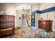The foyer welcomes you with elegant decor and a staircase leading to the upper levels at 11783 Ashley Ct, Seminole, FL 33772