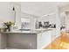 Modern kitchen featuring granite countertops, stainless steel appliances, and a convenient breakfast bar at 11808 Lancashire Dr, Tampa, FL 33626