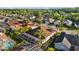 An aerial shot featuring a large screened-in pool, lush landscaping, and a private backyard at 11906 Middlebury Dr, Tampa, FL 33626