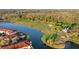 Breathtaking aerial view of the golf course and lake, showcasing luxurious community living and scenic landscapes at 11906 Middlebury Dr, Tampa, FL 33626