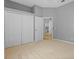 Neutral bedroom with large closet and view into the kitchen at 11906 Middlebury Dr, Tampa, FL 33626