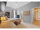 Bright bedroom with ensuite bathroom, ceiling fan, and stylish furnishings at 11906 Middlebury Dr, Tampa, FL 33626