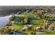 Scenic aerial view of the golf course highlighting the lush fairways and strategically placed sand traps at 11906 Middlebury Dr, Tampa, FL 33626