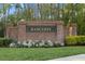 A welcoming brick sign for the Radcliffe community set among well-manicured landscaping at 11906 Middlebury Dr, Tampa, FL 33626