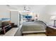Bedroom with neutral walls, ceiling fan, and natural light at 1226 Debuel Rd, Lutz, FL 33549