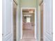 This primary bath with walk-in closets and large jetted tub at 1231 Corinth Greens Dr, Sun City Center, FL 33573