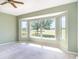 Bedroom offers a large bay window overlooking the property's green spaces at 1231 Corinth Greens Dr, Sun City Center, FL 33573