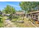 A backyard showcasing the raised garden beds and ample gardening space at 12317 Smokey Dr, Hudson, FL 34669