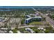 Aerial view showing the building's proximity to the nearby bay, highway and residential area at 1241 N Mcmullen Booth Rd, Clearwater, FL 33759
