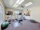 Well-equipped workout room with treadmill, exercise bikes, and ample space for fitness activities at 1241 N Mcmullen Booth Rd, Clearwater, FL 33759
