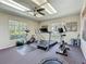 Well-lit workout room with treadmill, exercise bikes and ample space for fitness activities at 1241 N Mcmullen Booth Rd, Clearwater, FL 33759