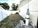 View of the backyard and pool equipment at 13924 Pathfinder Dr, Tampa, FL 33625