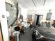 Garage with washer, dryer, water heater, and car at 13924 Pathfinder Dr, Tampa, FL 33625