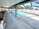 Relaxing screened-in pool area for leisure and entertainment at 13924 Pathfinder Dr, Tampa, FL 33625