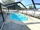 Relaxing screened-in pool area for leisure and entertainment at 13924 Pathfinder Dr, Tampa, FL 33625