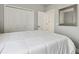 Neutral bedroom with a comfortable bed and closet at 1517 Little Brook Ln, Brandon, FL 33511