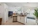 Bright open kitchen with granite countertops and stainless steel dishwasher at 1517 Little Brook Ln, Brandon, FL 33511