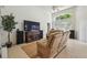 Spacious living room with large windows, high ceilings, and tile floors at 1517 Little Brook Ln, Brandon, FL 33511