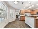 Bright kitchen features granite countertops and an open floor plan at 1816 Curry Rd, Lutz, FL 33549