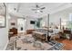 Spacious main bedroom features tray ceilings, hardwood floors, and a decorative rug at 1816 Curry Rd, Lutz, FL 33549