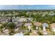 Overhead view of a neighborhood with well-maintained homes, landscaping, and access to local amenities at 221 Lakeway Ln, Apollo Beach, FL 33572