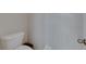 Small bathroom featuring a standard toilet and a hand towel rack at 221 Lakeway Ln, Apollo Beach, FL 33572